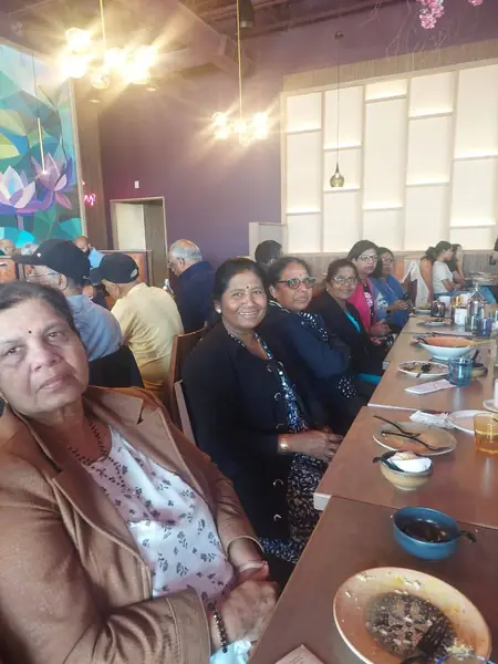 People seated at a restaurant table