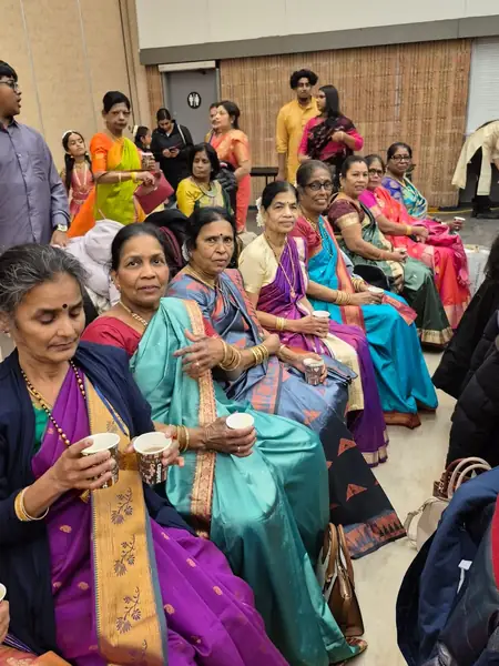 Women in saris seated together