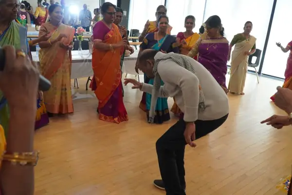 People dancing in a hall