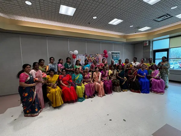 Large group seated together in a hall