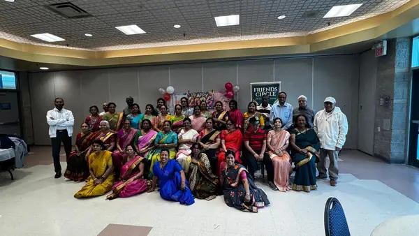 Large group posing in a hall